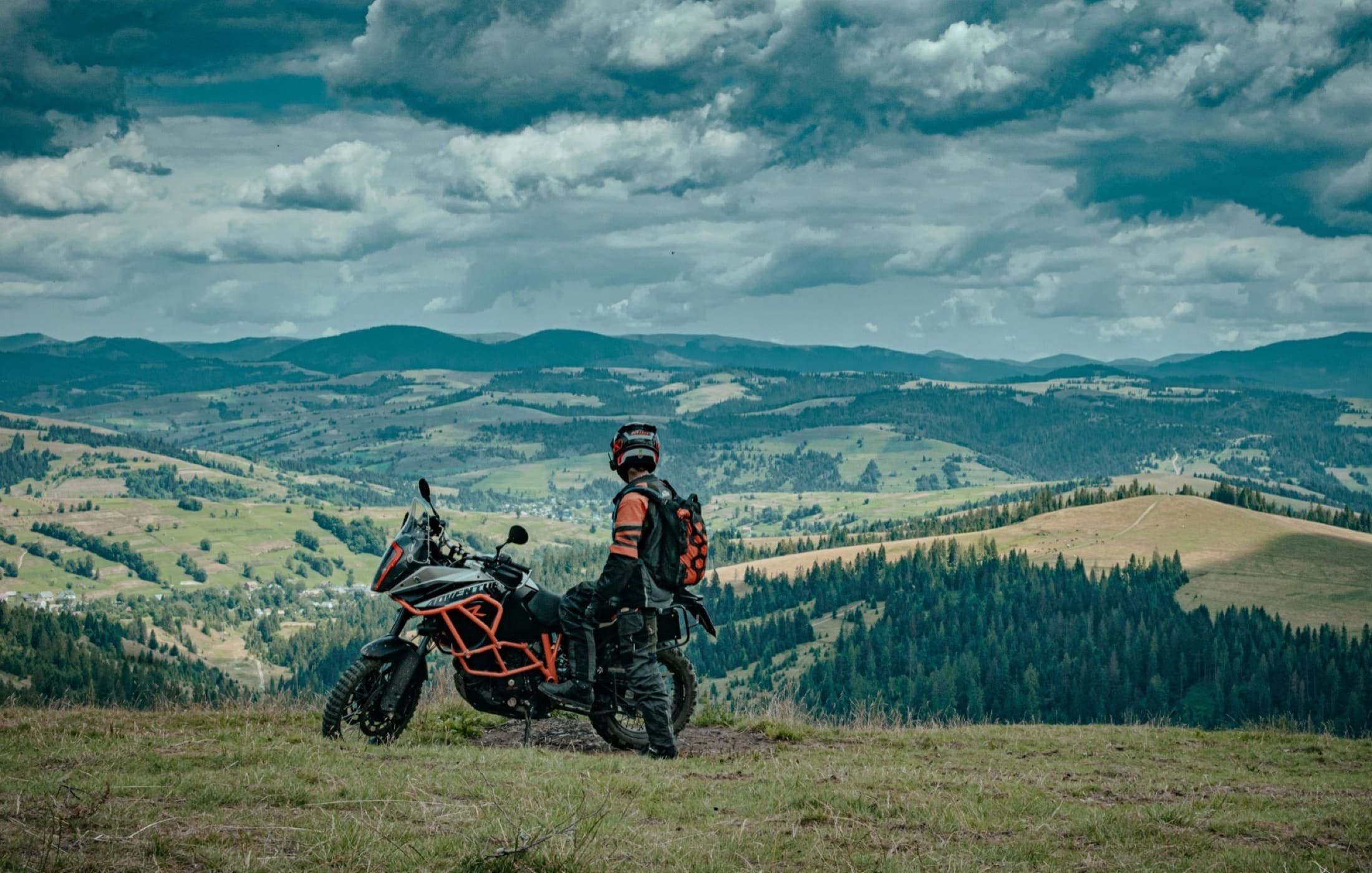 Adventure motorcycles parked above a mountain valley in Northern Vietnam